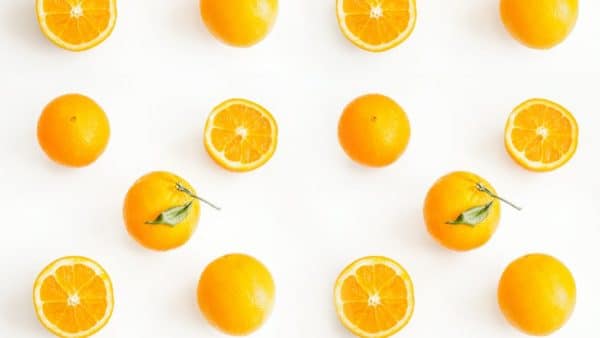 photo of sliced orange citrus fruits